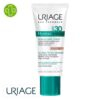 Produit de la marque Uriage Hyséac 3-Regul Soin Global Teinté Anti-Imperfections Spf30 – 40ml sur un fond blanc avec un logo Parachezvous et celui de de la marque Uriage