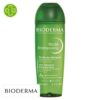 Produit de la marque Bioderma Nodé Shampooing Fluide Non Détergent - 200ml sur un fond blanc avec un logo Parachezvous et celui de de la marque Bioderma