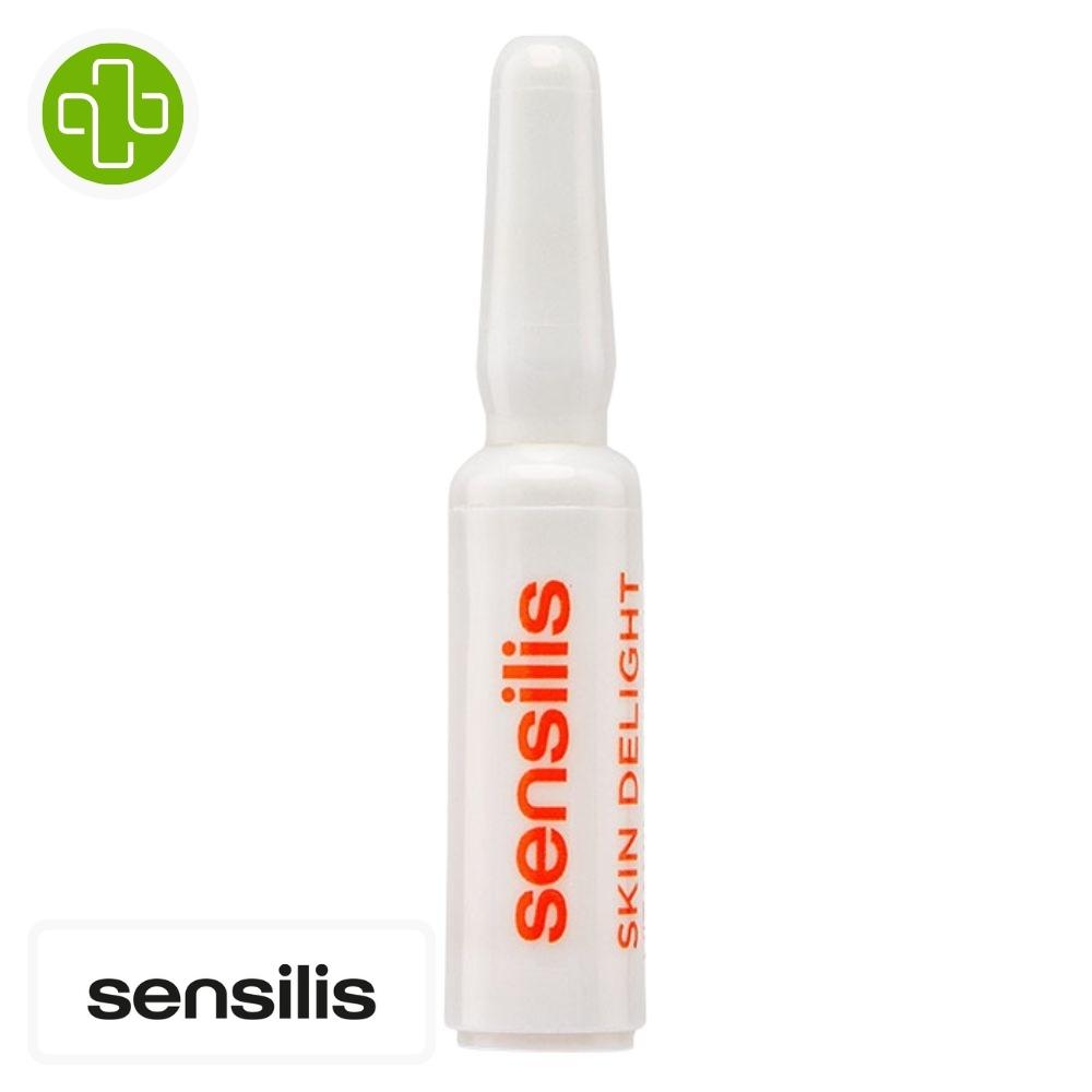Produit de la marque sensilis skin delight anti-taches - 15 ampoules sur un fond blanc avec un logo parachezvous et celui de de la marque sensilis